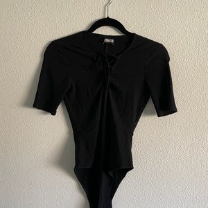 Reformation Bodysuit black and I’m excellent condition
